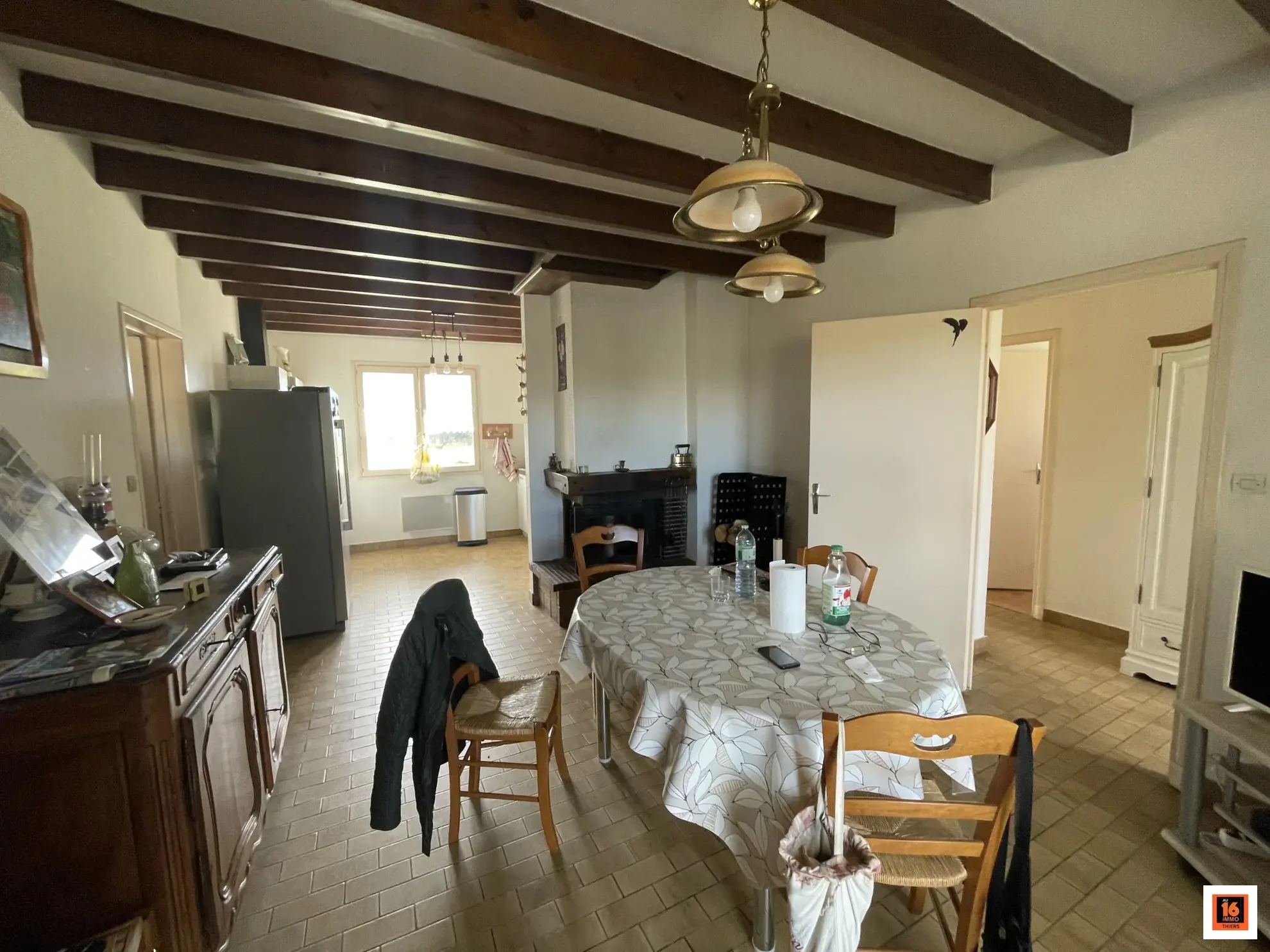 Maison de plain-pied à vendre à Orléat avec grand jardin clos 