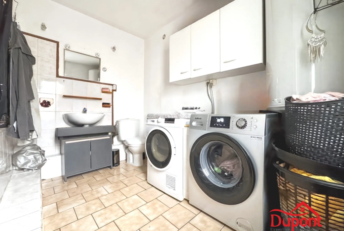 Charmante maison de campagne à Viesly de 76,76 m² avec jardin et cave, à rénover 