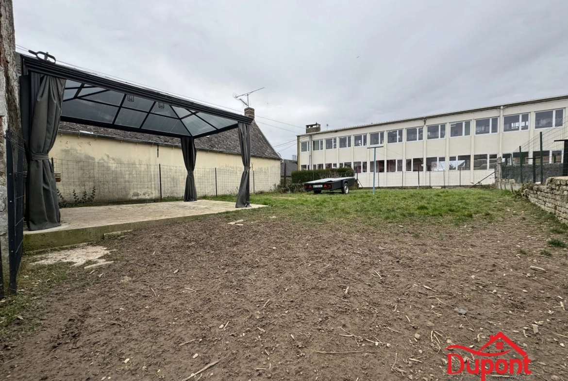 Charmante maison de campagne à Viesly de 76,76 m² avec jardin et cave, à rénover 