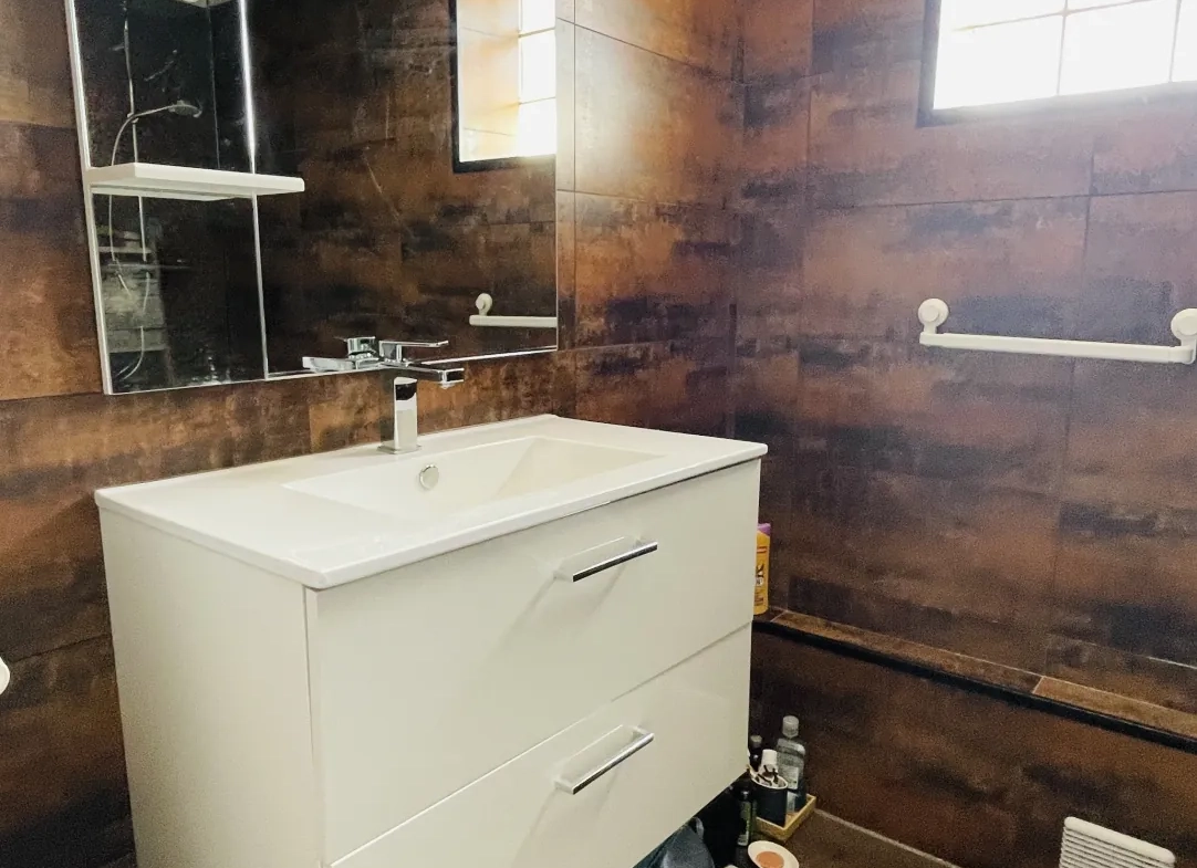 Appartement T3 de 57 m² avec balcon, garage et cave à Clermont-Ferrand 