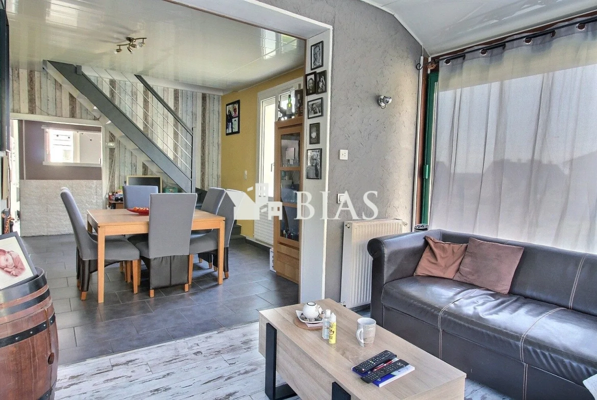 Maison de plain-pied à vendre au Trait avec jardin et garage potentiel 