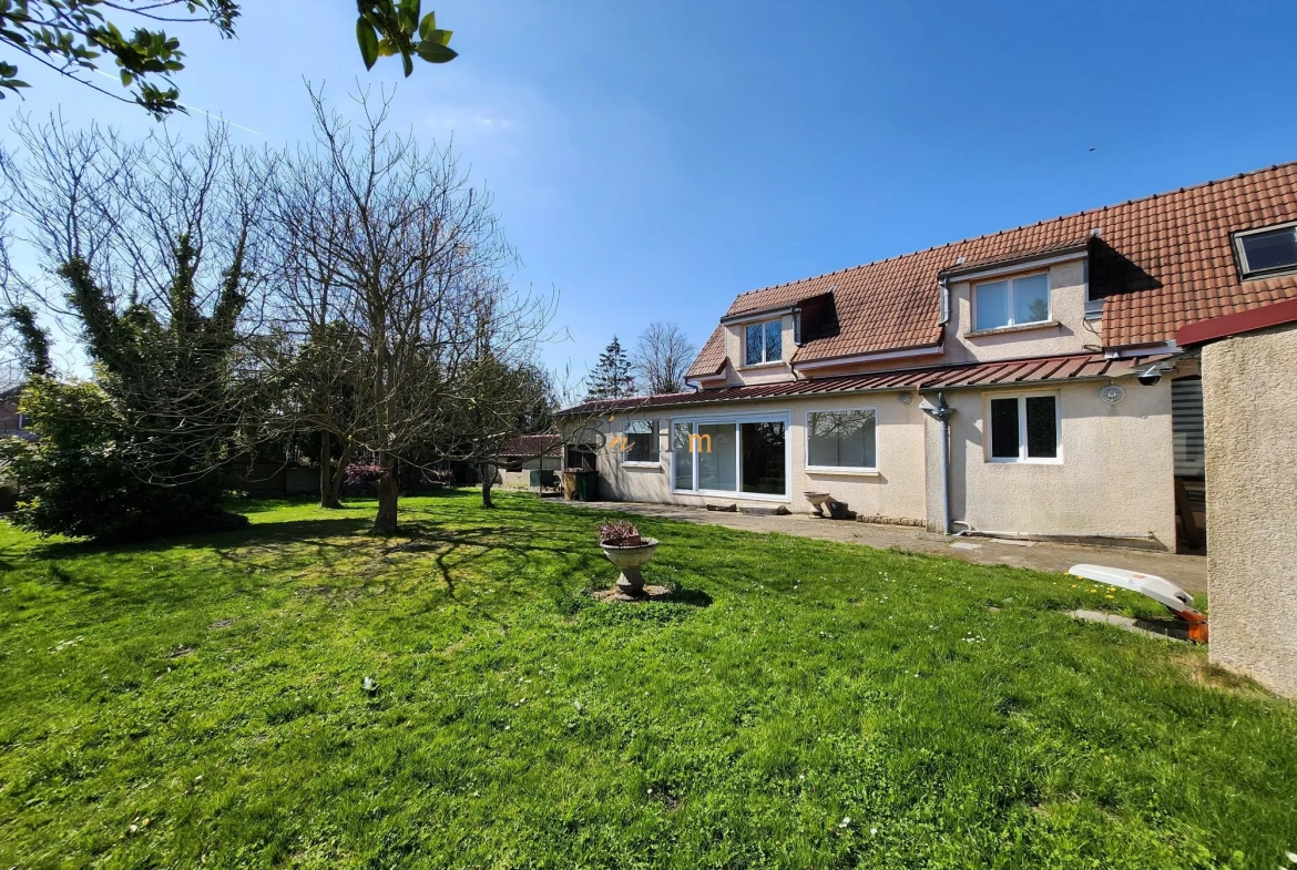 Charmante maison individuelle avec grand jardin et garage spacieux à Courcelles-le-Comte 
