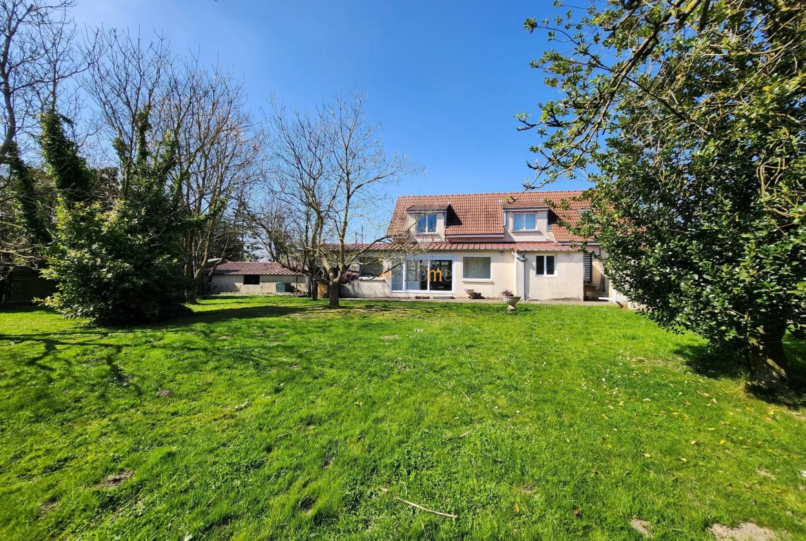 Charmante maison individuelle avec grand jardin et garage spacieux à Courcelles-le-Comte 