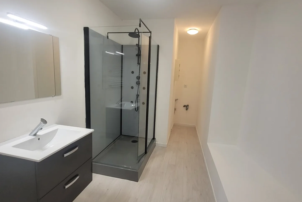 Appartement de 96,72 m² en plein centre de Jonzac avec terrasse et cour intérieure 