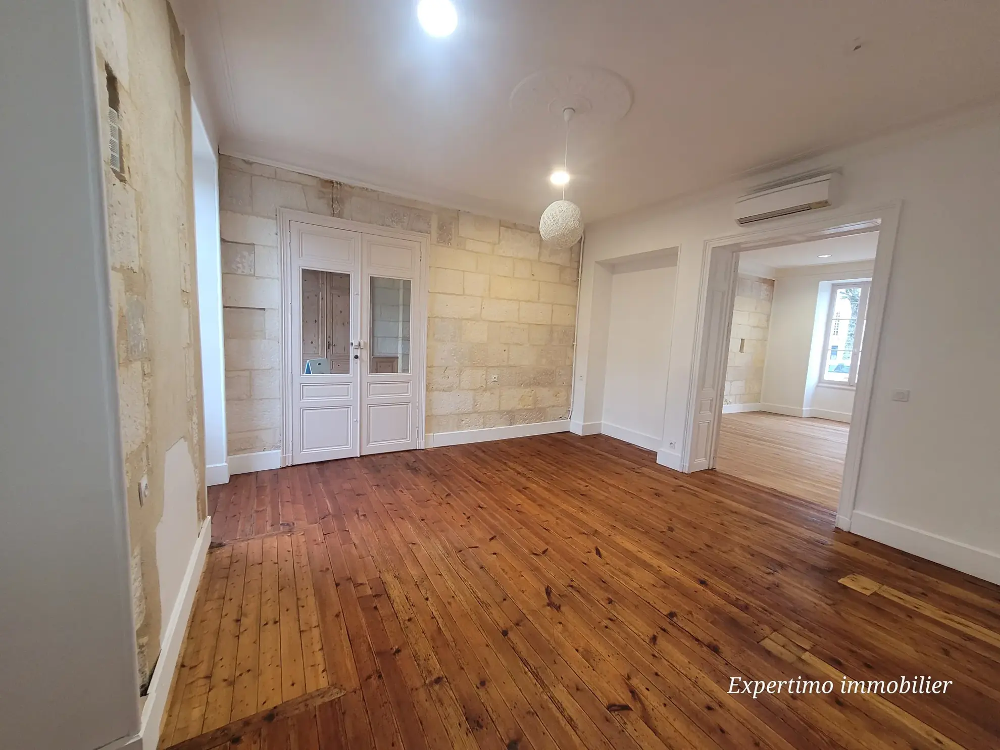Appartement de 96,72 m² en plein centre de Jonzac avec terrasse et cour intérieure 