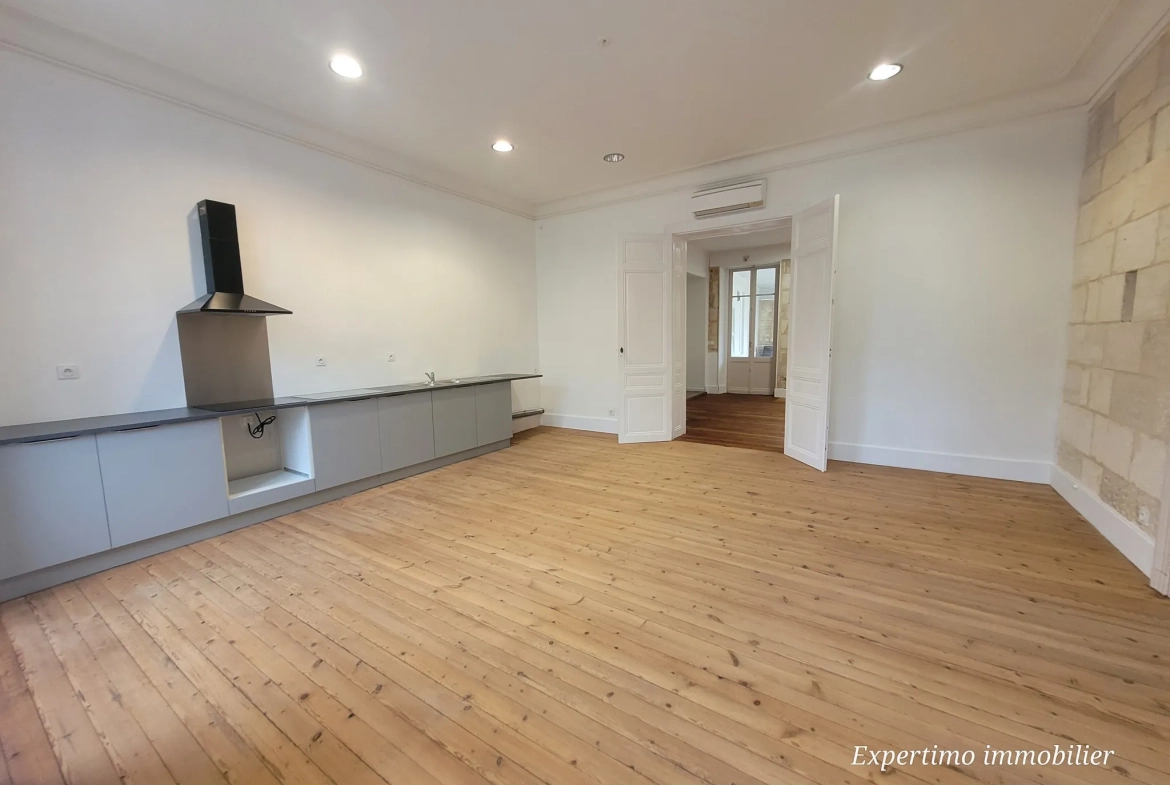 Appartement de 96,72 m² en plein centre de Jonzac avec terrasse et cour intérieure 