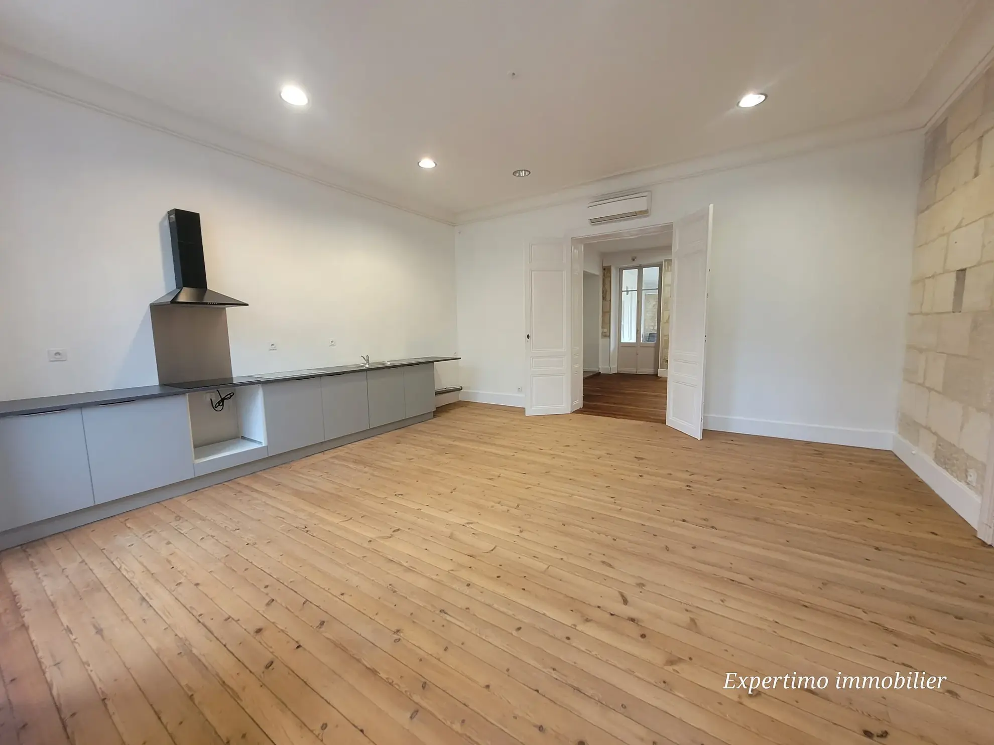 Appartement de 96,72 m² en plein centre de Jonzac avec terrasse et cour intérieure 