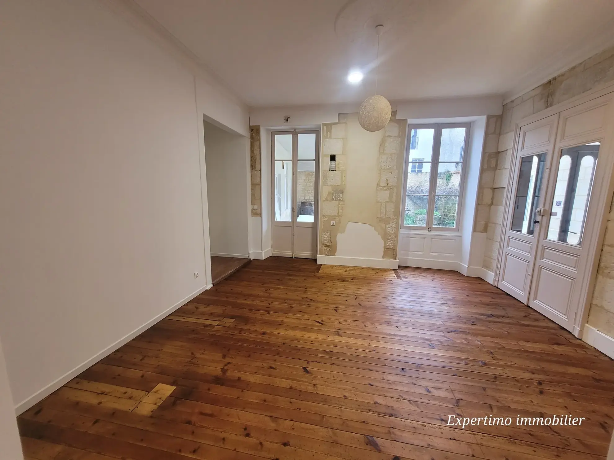 Appartement de 96,72 m² en plein centre de Jonzac avec terrasse et cour intérieure 