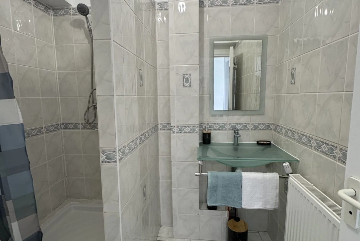 Appartement à vendre à Vert-Saint-Denis avec cave et parking, résidence calme 