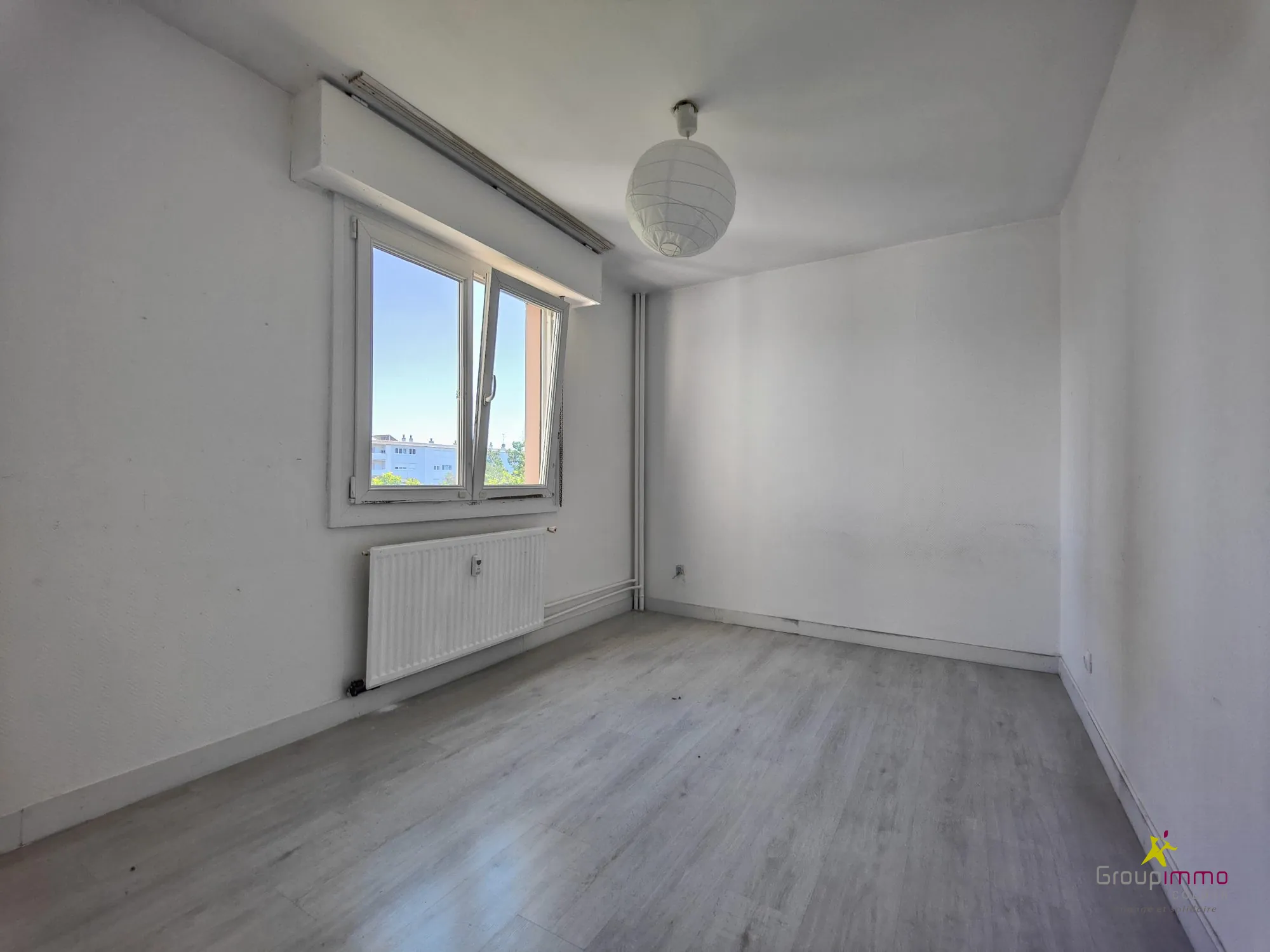 Appartement 4 pièces à vendre à Colmar avec cave et parking 
