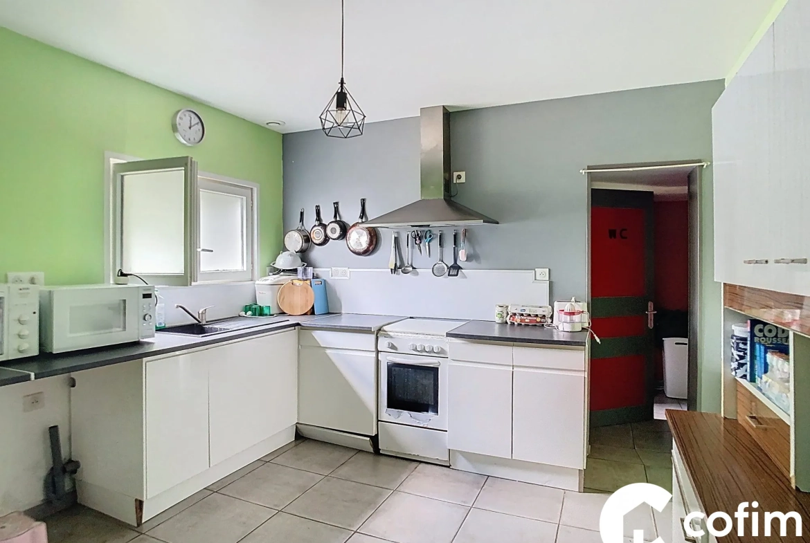 Maison rénovée 118 m² avec terrain de 2300 m² proche Garlin 
