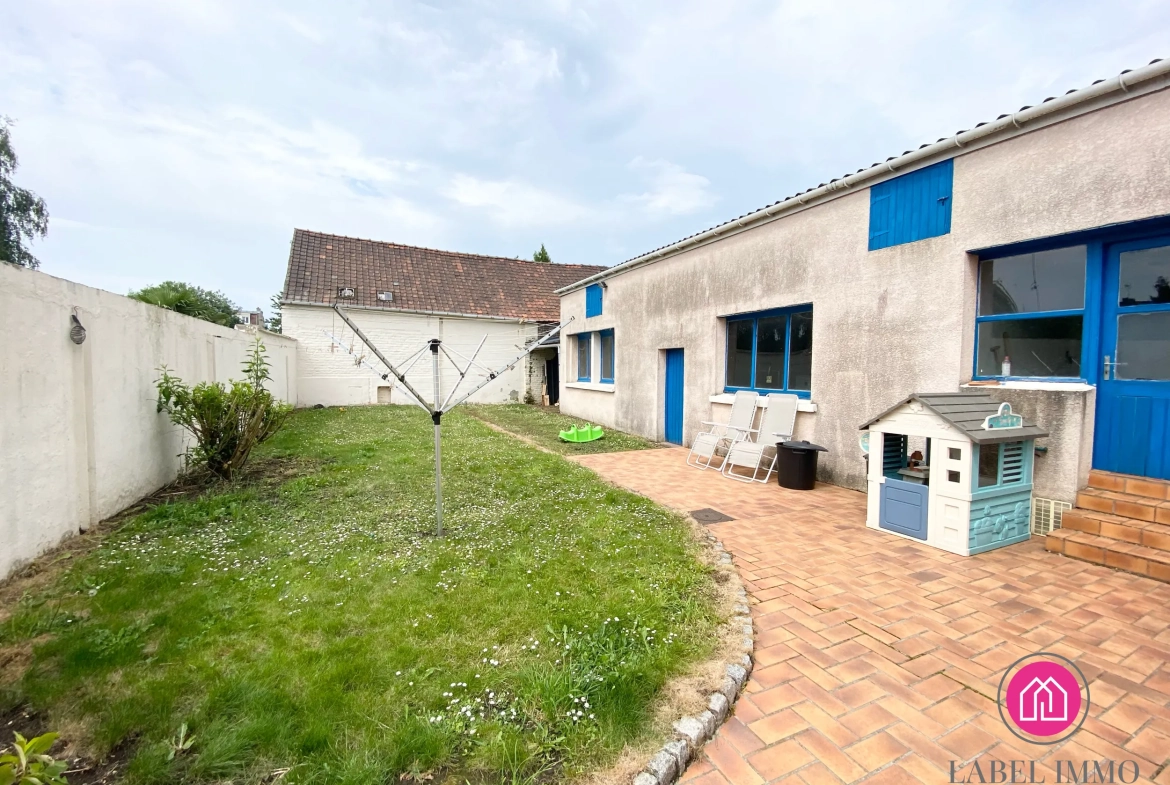 A vendre maison de 132 m² à Roeulx avec jardin, dépendances et garage 