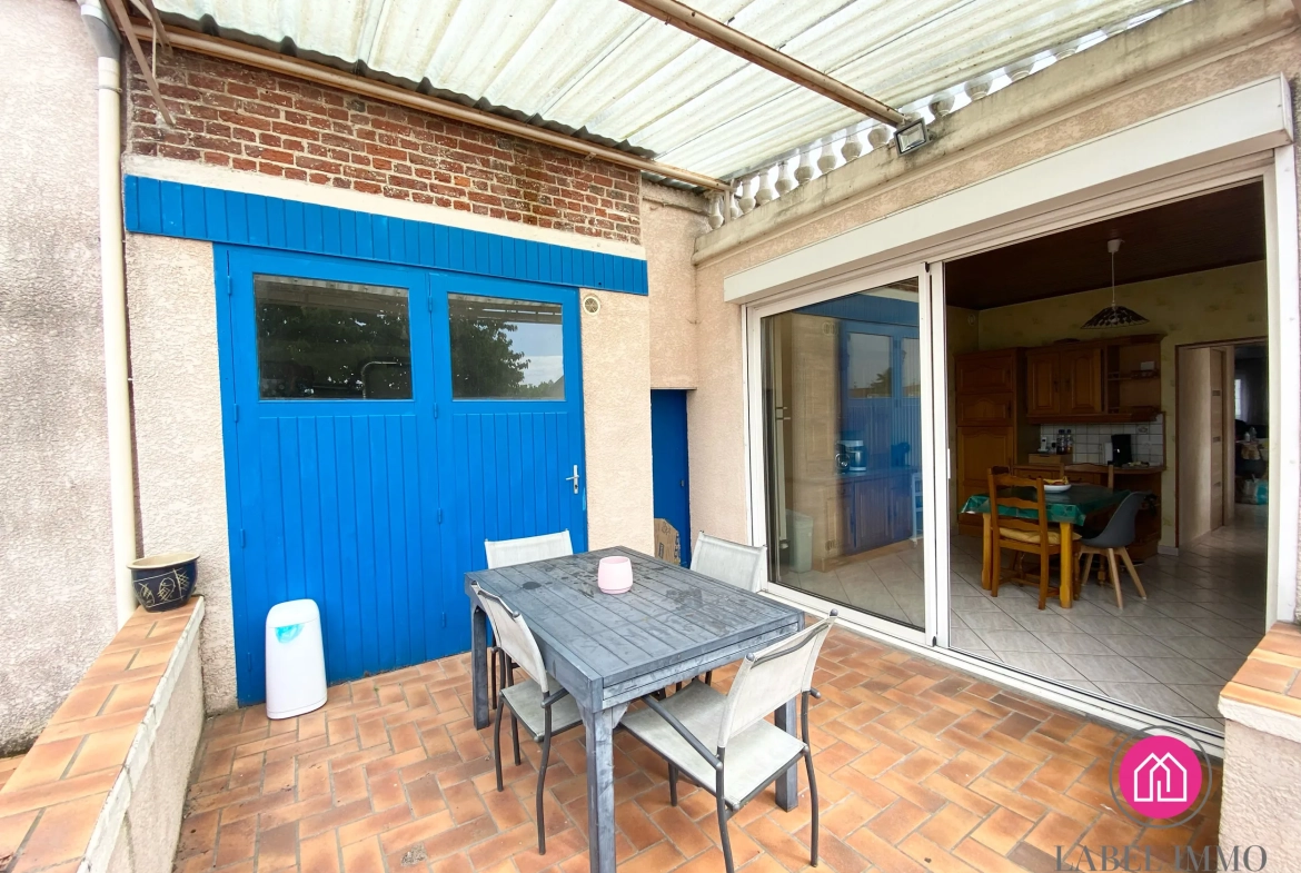 A vendre maison de 132 m² à Roeulx avec jardin, dépendances et garage 