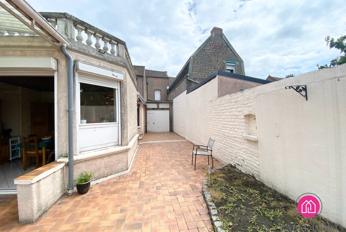 A vendre maison de 132 m² à Roeulx avec jardin, dépendances et garage 