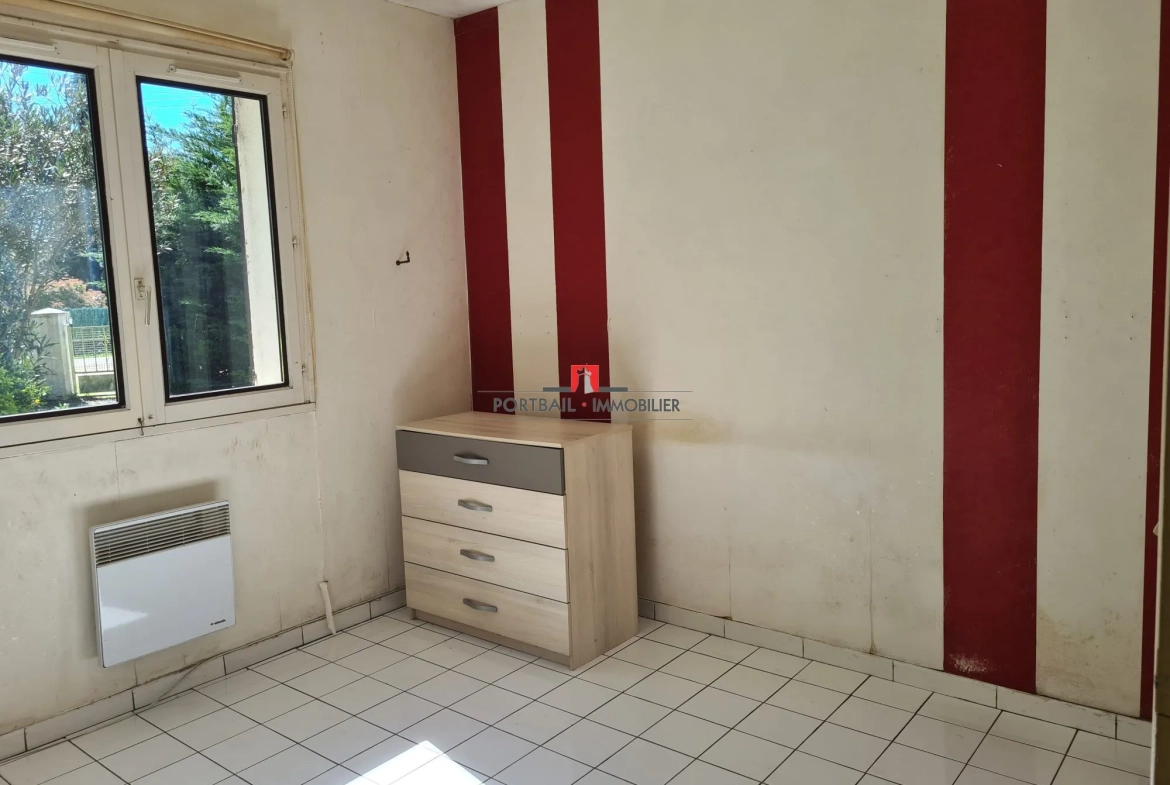 Maison de plain-pied à vendre à Ambès avec grand terrain et potentiel 
