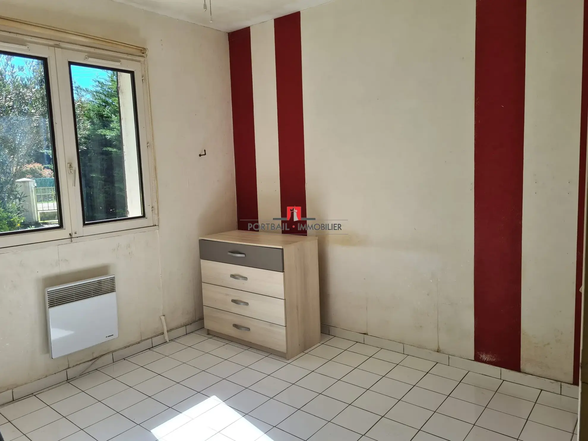 Maison de plain-pied à vendre à Ambès avec grand terrain et potentiel 
