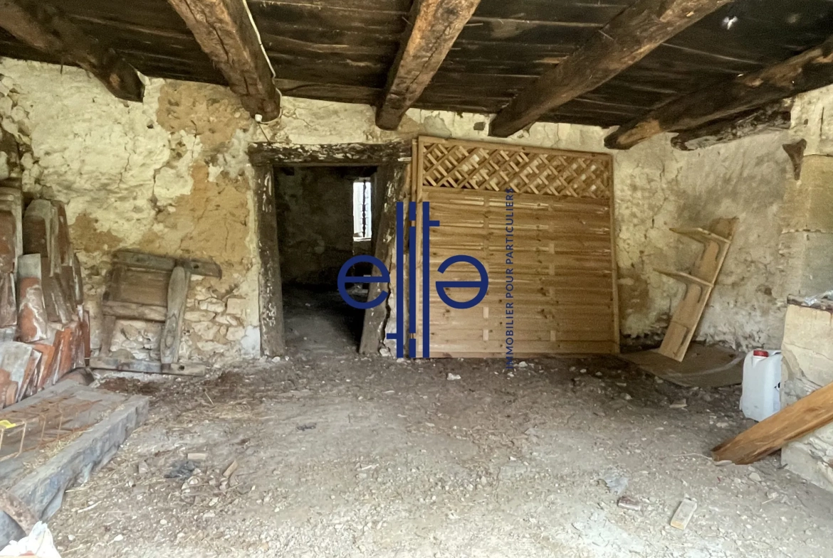 Belle opportunité d'investissement : grange en pierre avec garage à Coulounieix-Bourg 