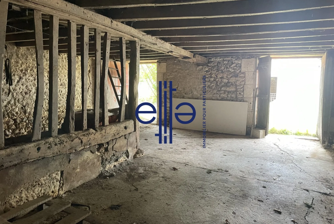 Belle opportunité d'investissement : grange en pierre avec garage à Coulounieix-Bourg 
