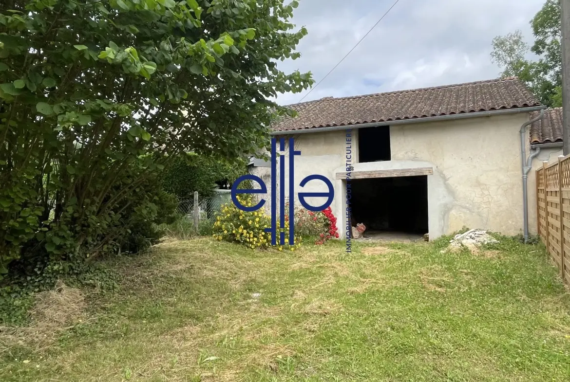 Belle opportunité d'investissement : grange en pierre avec garage à Coulounieix-Bourg 