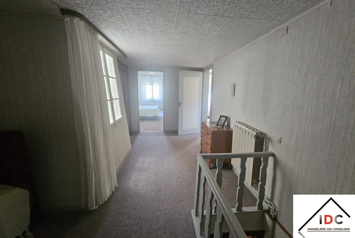 Maison de village à vendre avec jardin et garage près de Dieuze 