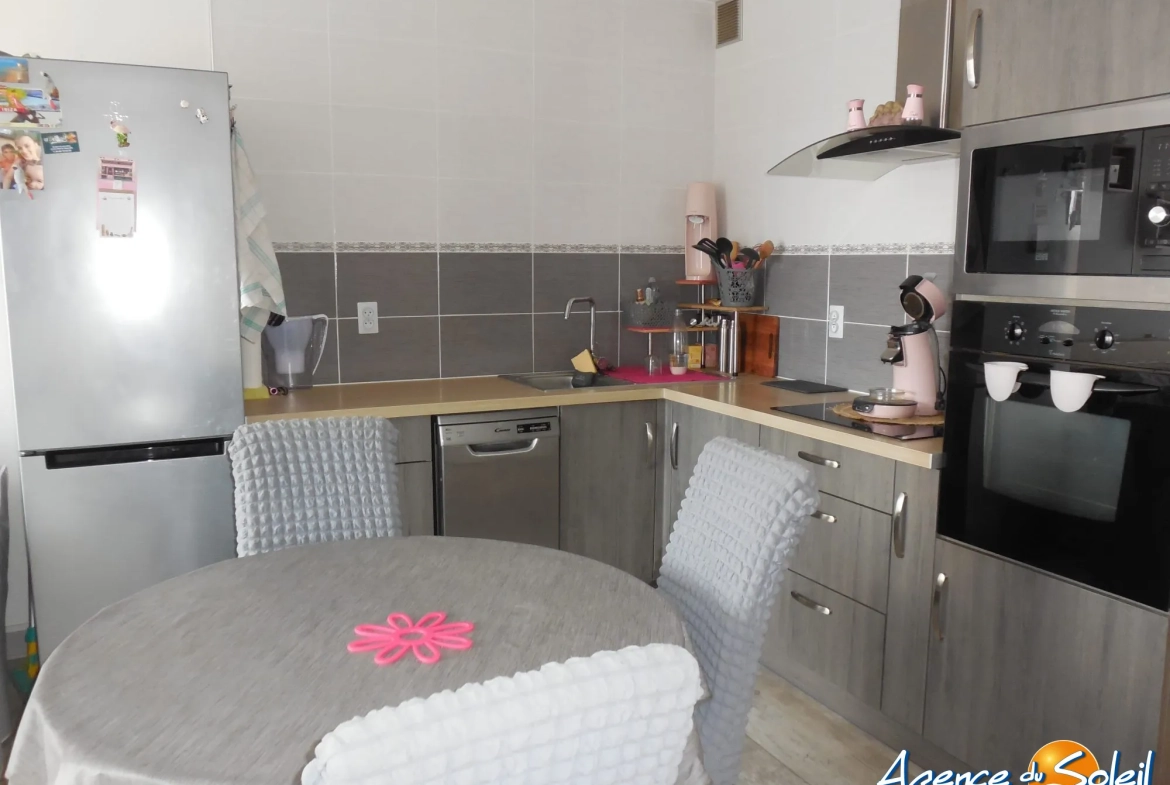 Appartement T3 en vente à Port-la-Nouvelle avec balcon, garage et vue mer 