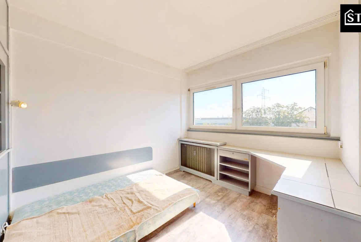 Appartement T2 lumineux avec terrasse et parking à Montbéliard – Idéal investisseur 
