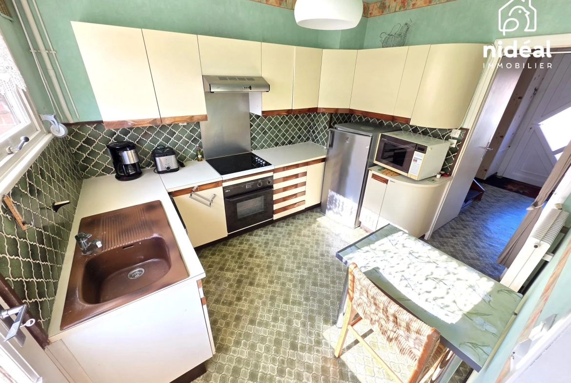 Maison à vendre à Maubeuge - 80 m², jardin et garage dans secteur calme 