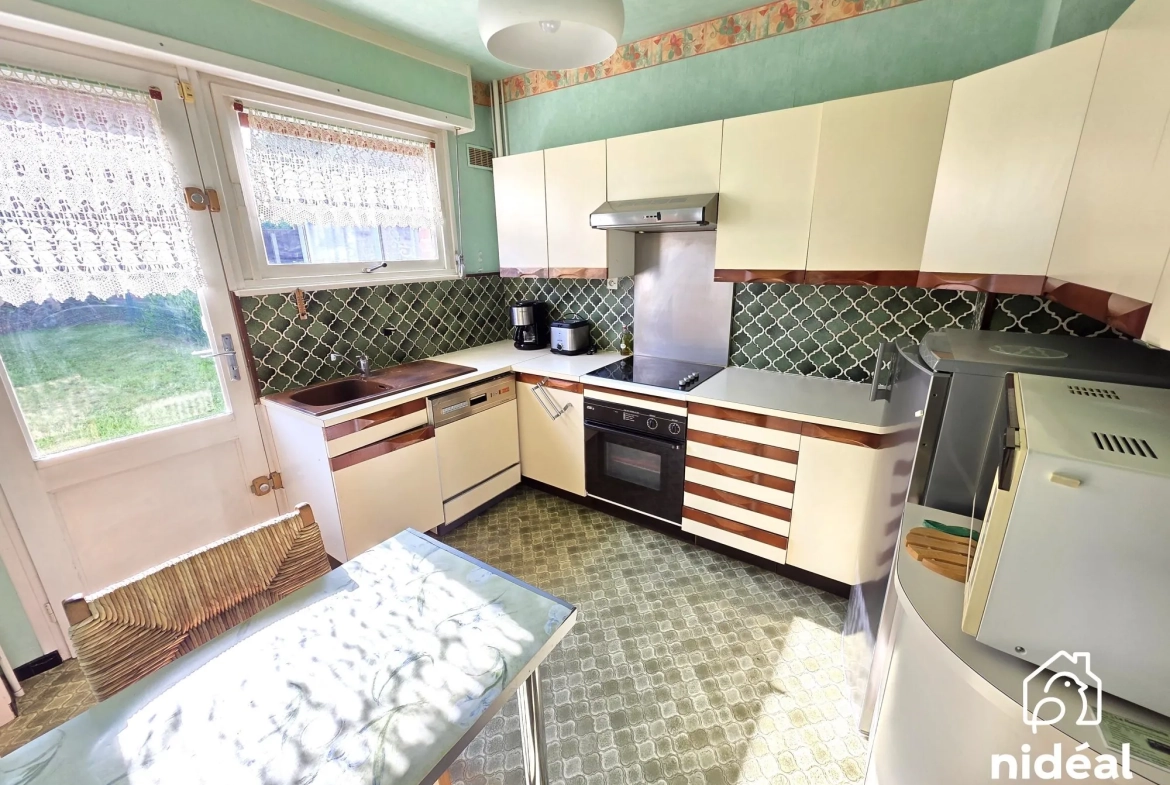 Maison à vendre à Maubeuge - 80 m², jardin et garage dans secteur calme 