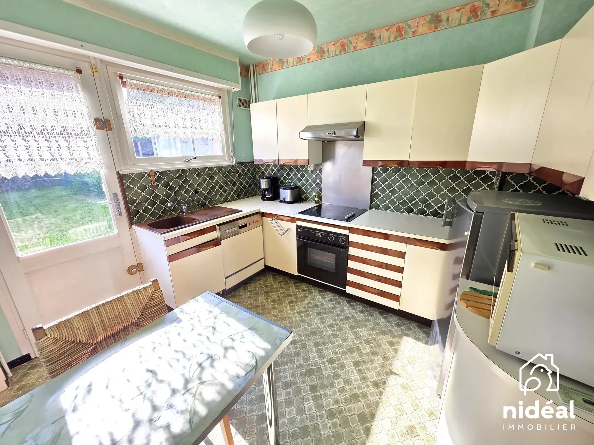 Maison à vendre à Maubeuge - 80 m², jardin et garage dans secteur calme 