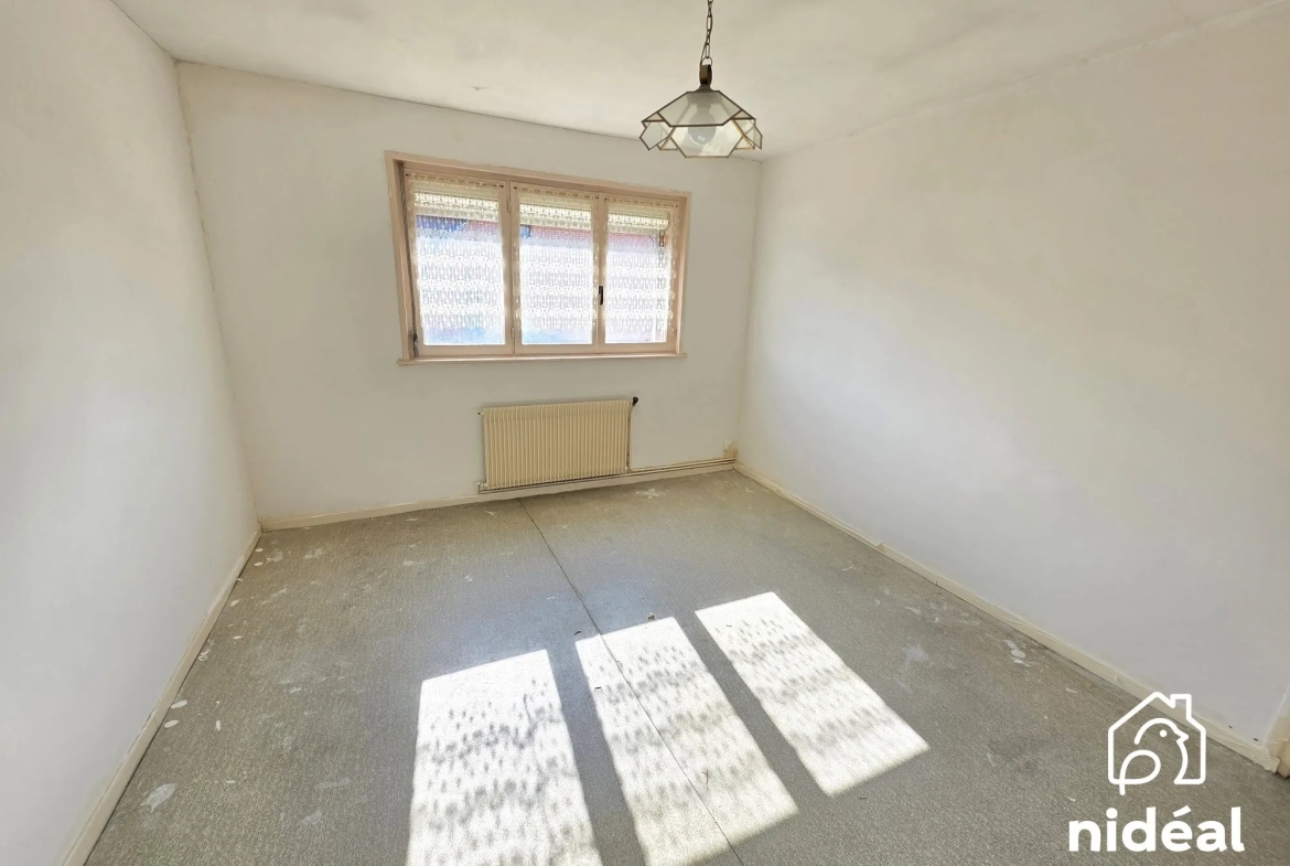 Maison à vendre à Maubeuge - 80 m², jardin et garage dans secteur calme 