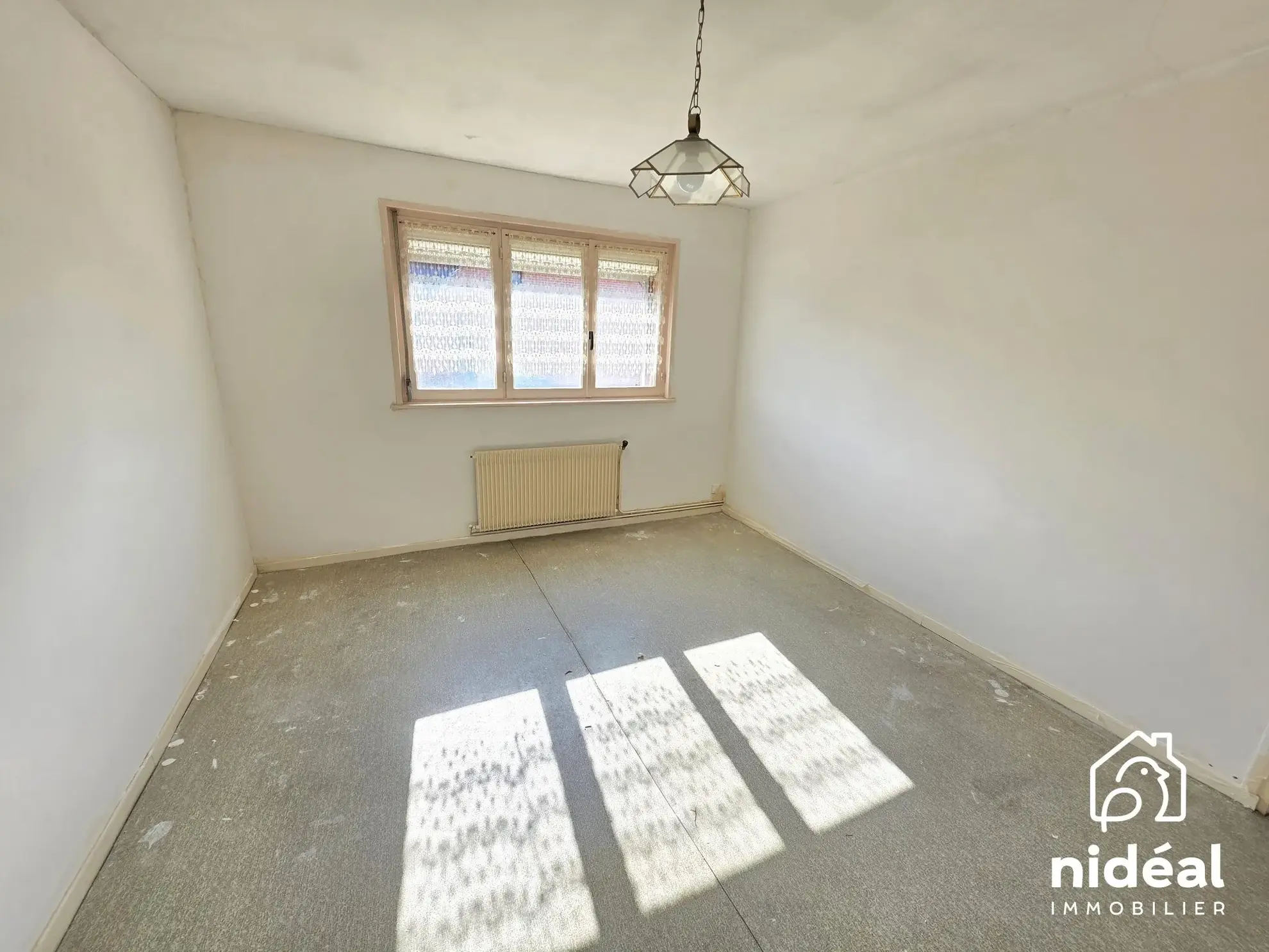 Maison à vendre à Maubeuge - 80 m², jardin et garage dans secteur calme 