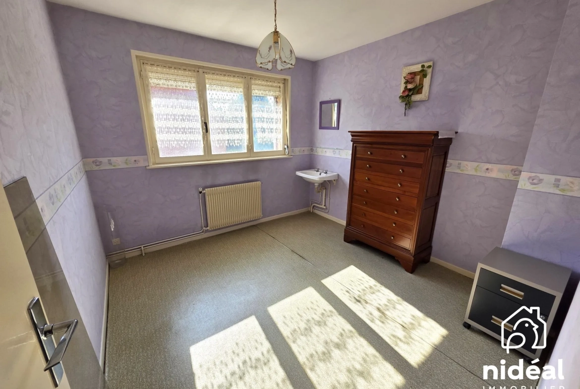 Maison à vendre à Maubeuge - 80 m², jardin et garage dans secteur calme 