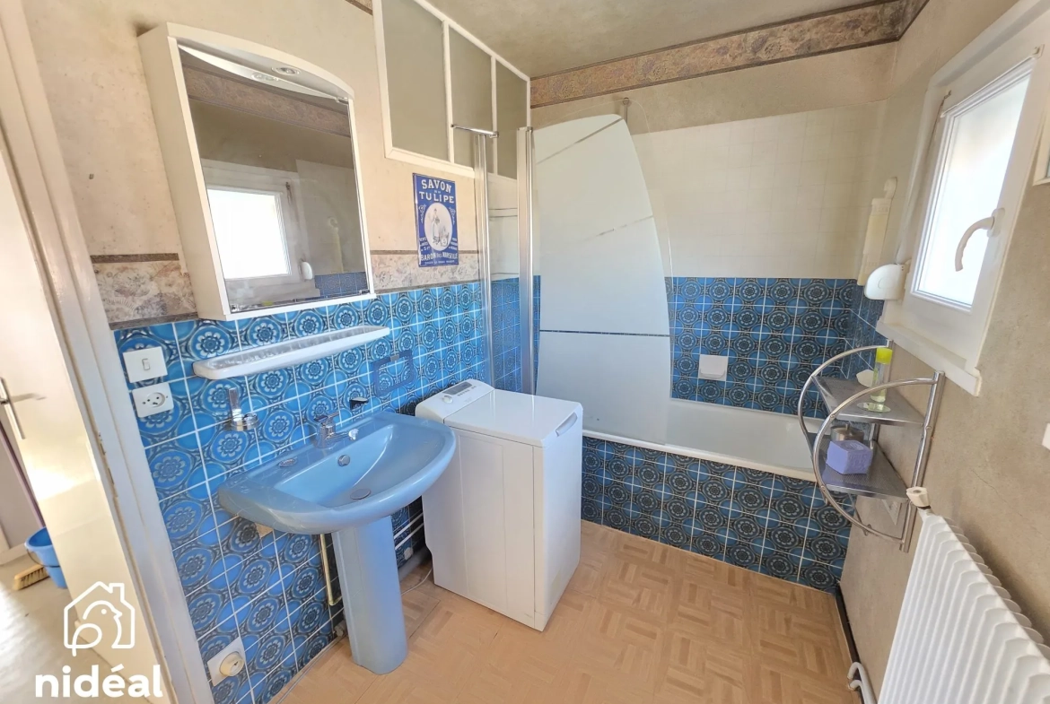 Maison à vendre à Maubeuge - 80 m², jardin et garage dans secteur calme 