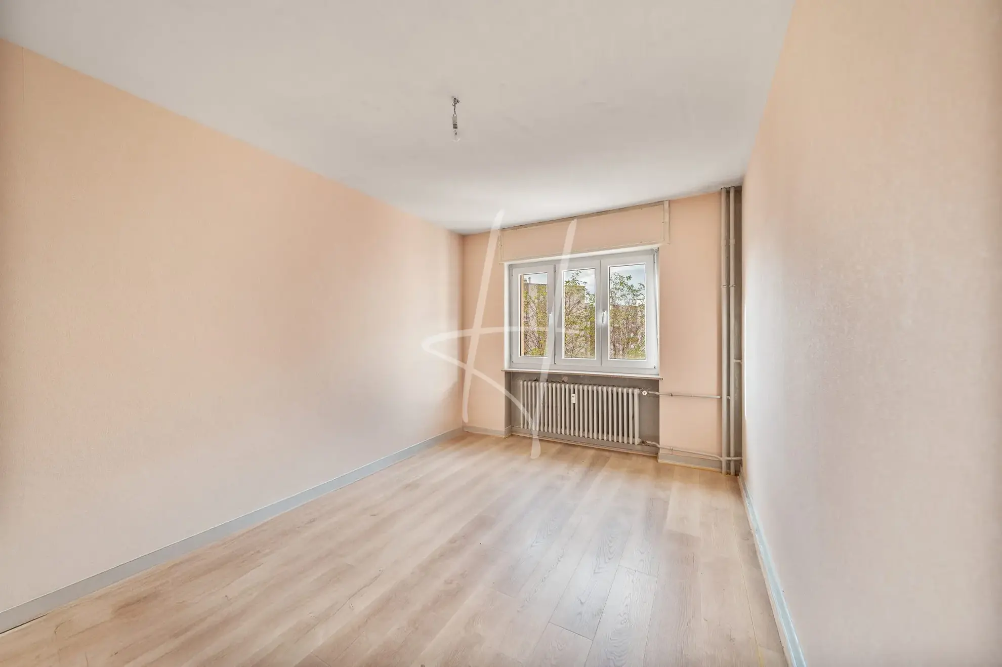 Appartement T4 à Metz, 70 m², proche gare, avec balcon et cave 