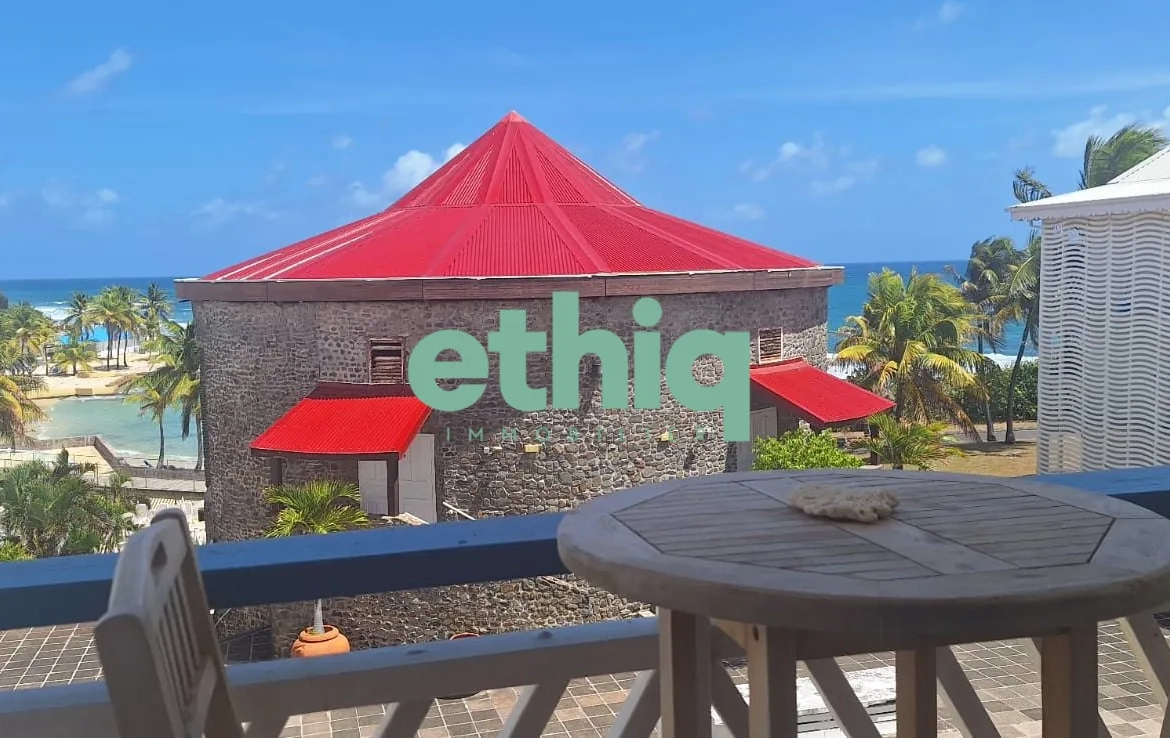 Studio à vendre à Saint-François avec vue mer, terrasse et piscine 