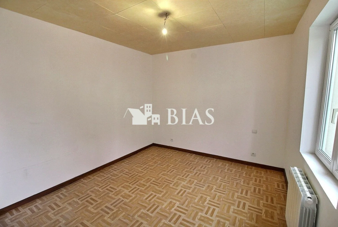 Maison à vendre à Chambord - 57 m², terrain clos, garage double 