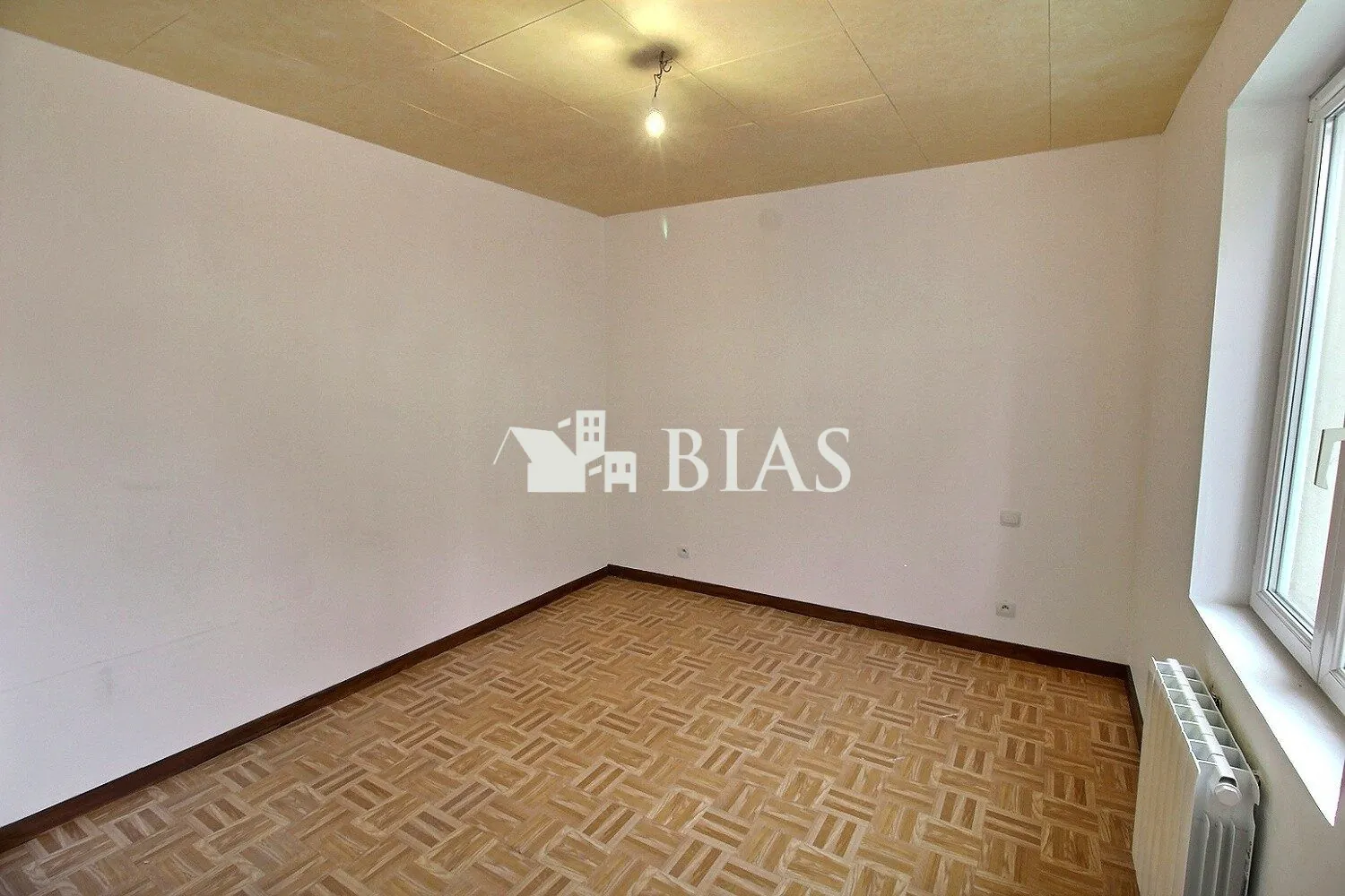 Maison à vendre à Chambord - 57 m², terrain clos, garage double 