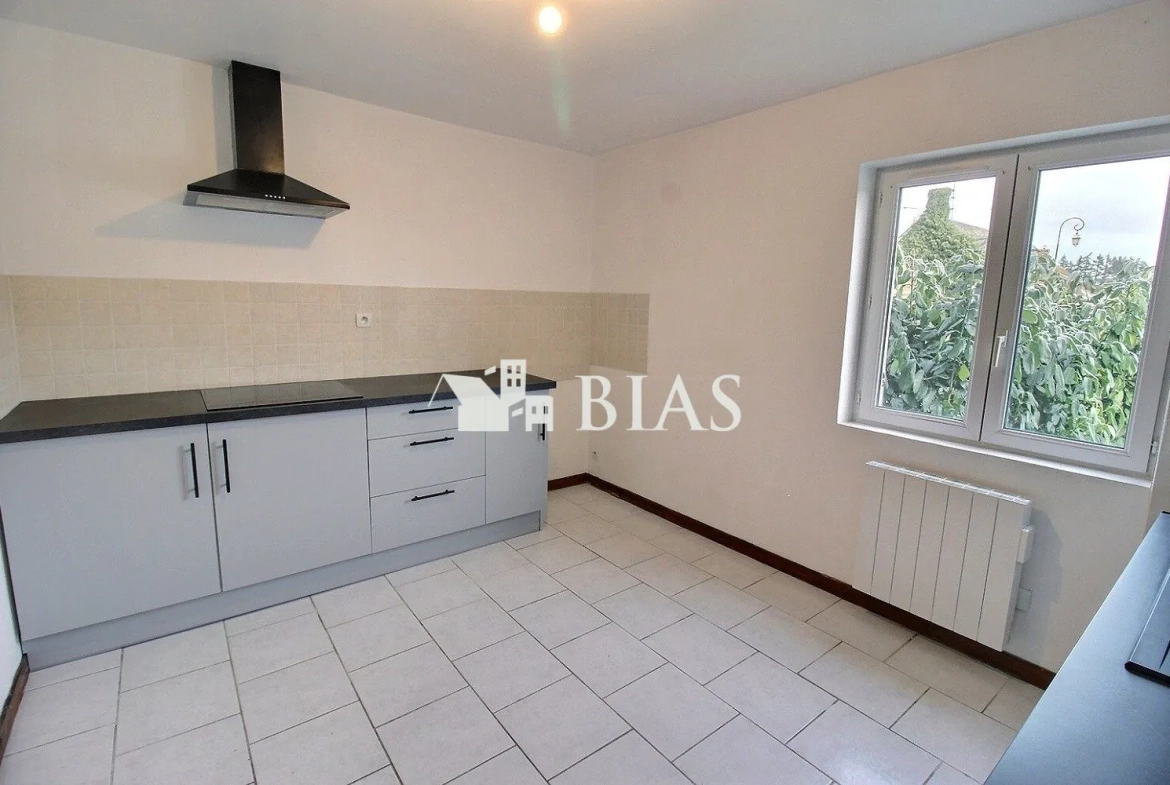Maison à vendre à Chambord - 57 m², terrain clos, garage double 