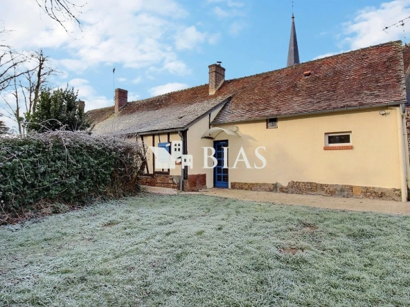 Maison à vendre à Chambord - 57 m², terrain clos, garage double