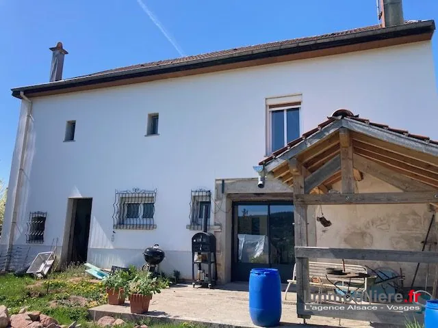 Maison à vendre à La Houssière avec vue panoramique, jardin et garage 