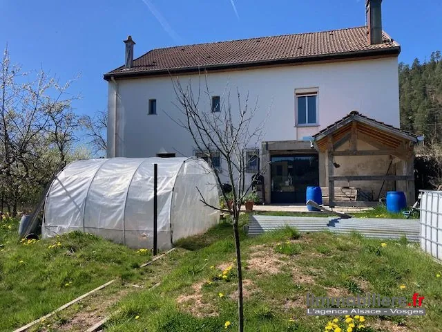 Maison à vendre à La Houssière avec vue panoramique, jardin et garage 