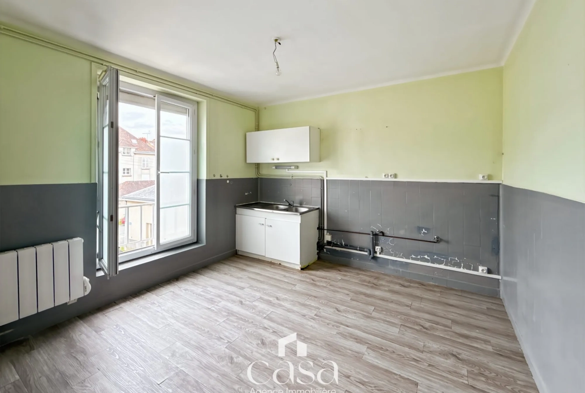 Appartement 3 pièces à Falaise en centre-ville avec cave et chauffage électrique 