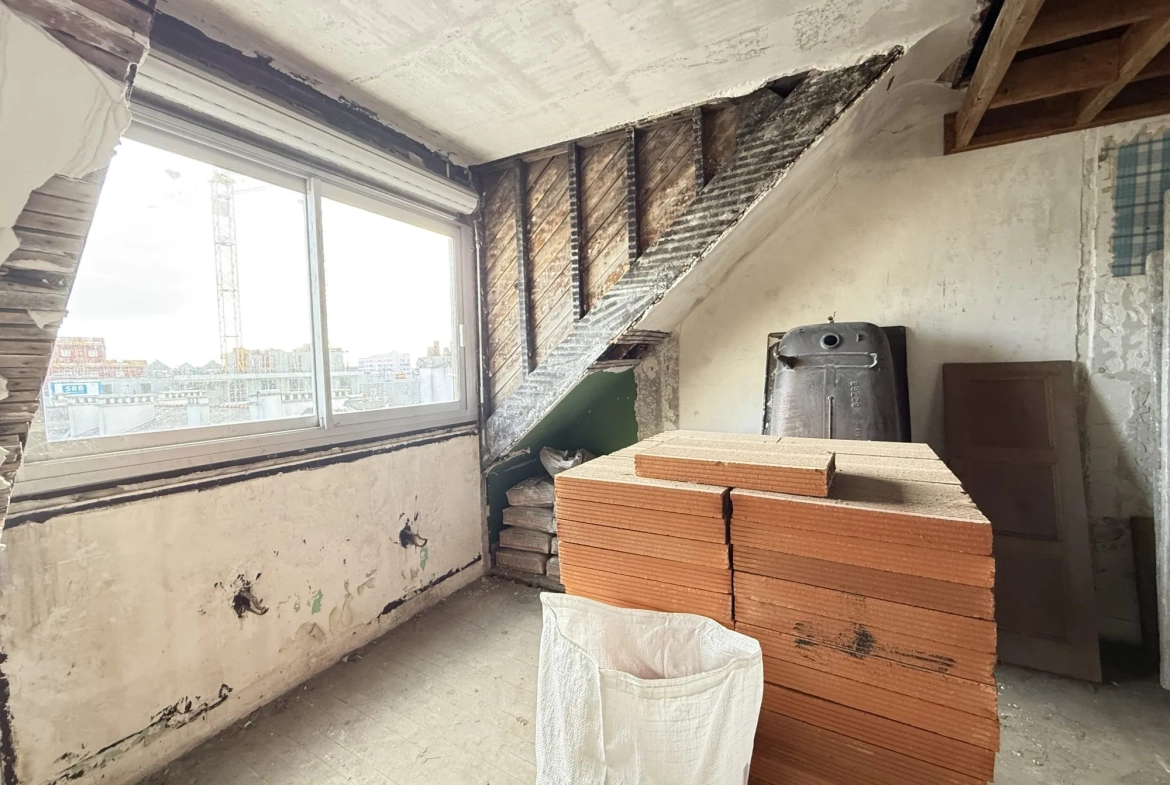 Appartement T3 à rénover au centre de Lorient avec cave et faibles charges 
