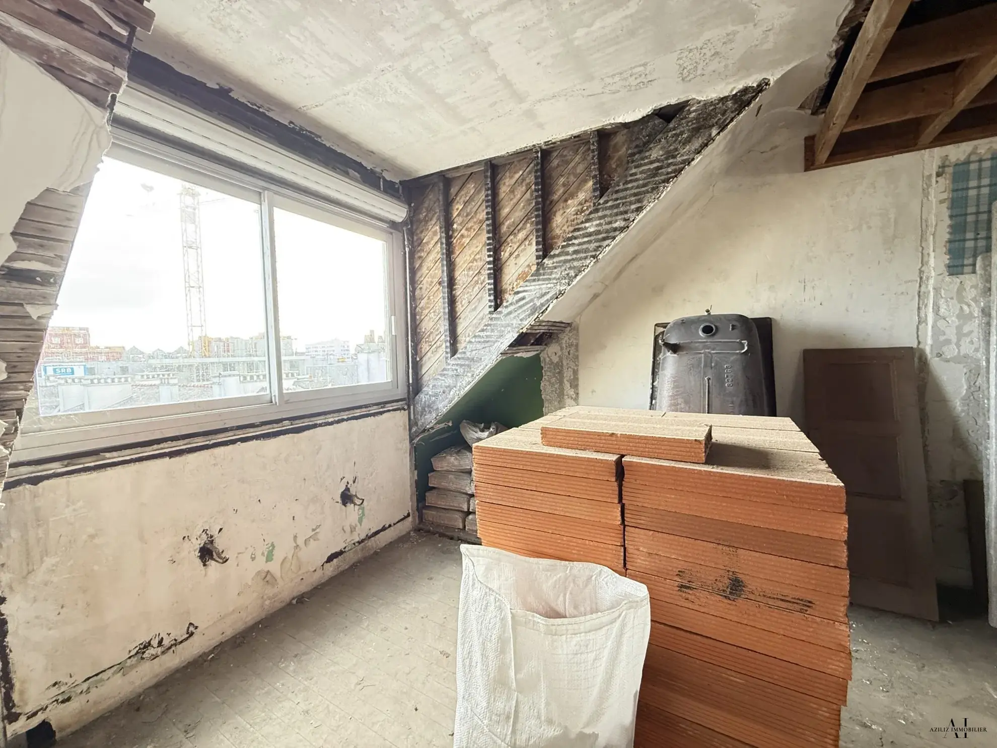 Appartement T3 à rénover au centre de Lorient avec cave et faibles charges 