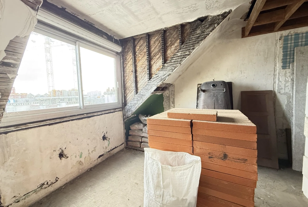 Appartement T3 à rénover au centre de Lorient avec cave et faibles charges 