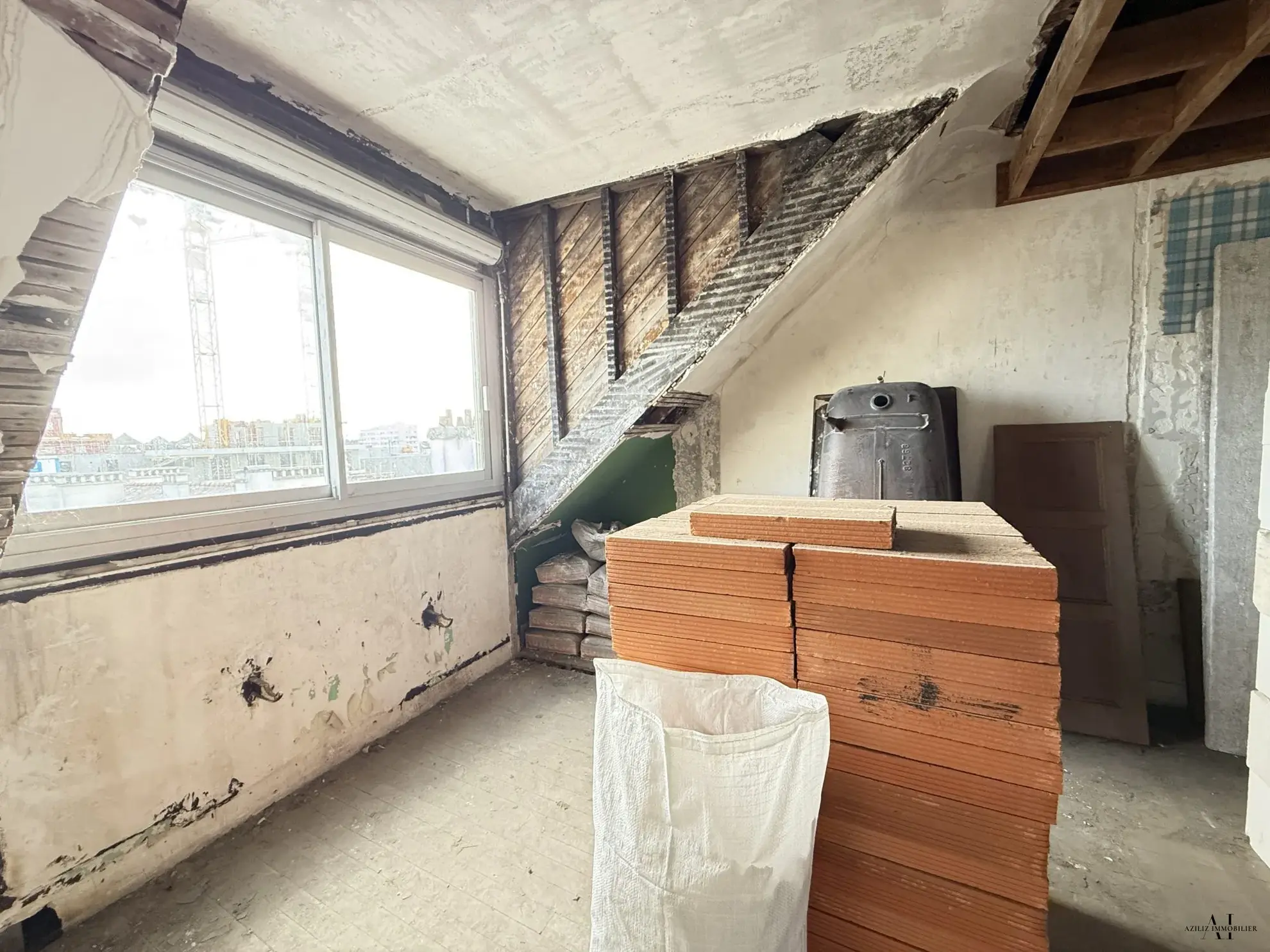Appartement T3 à rénover au centre de Lorient avec cave et faibles charges 