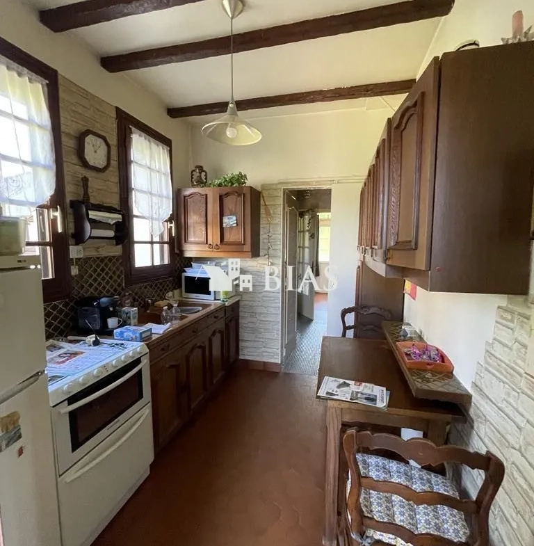 Maison à vendre au Trait avec jardin, garage et potentiel de rénovation 