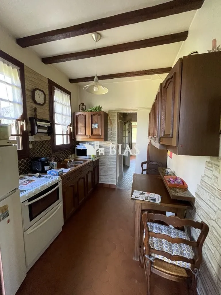 Maison à vendre au Trait avec jardin, garage et potentiel de rénovation 