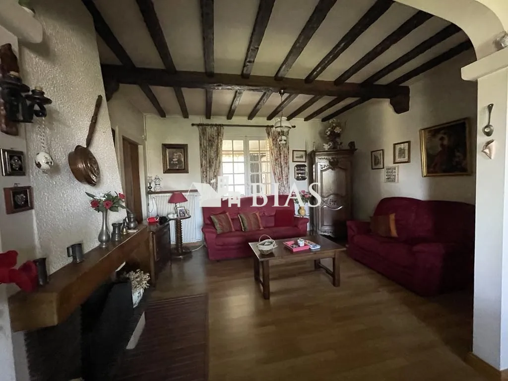 Maison à vendre au Trait avec jardin, garage et potentiel de rénovation 