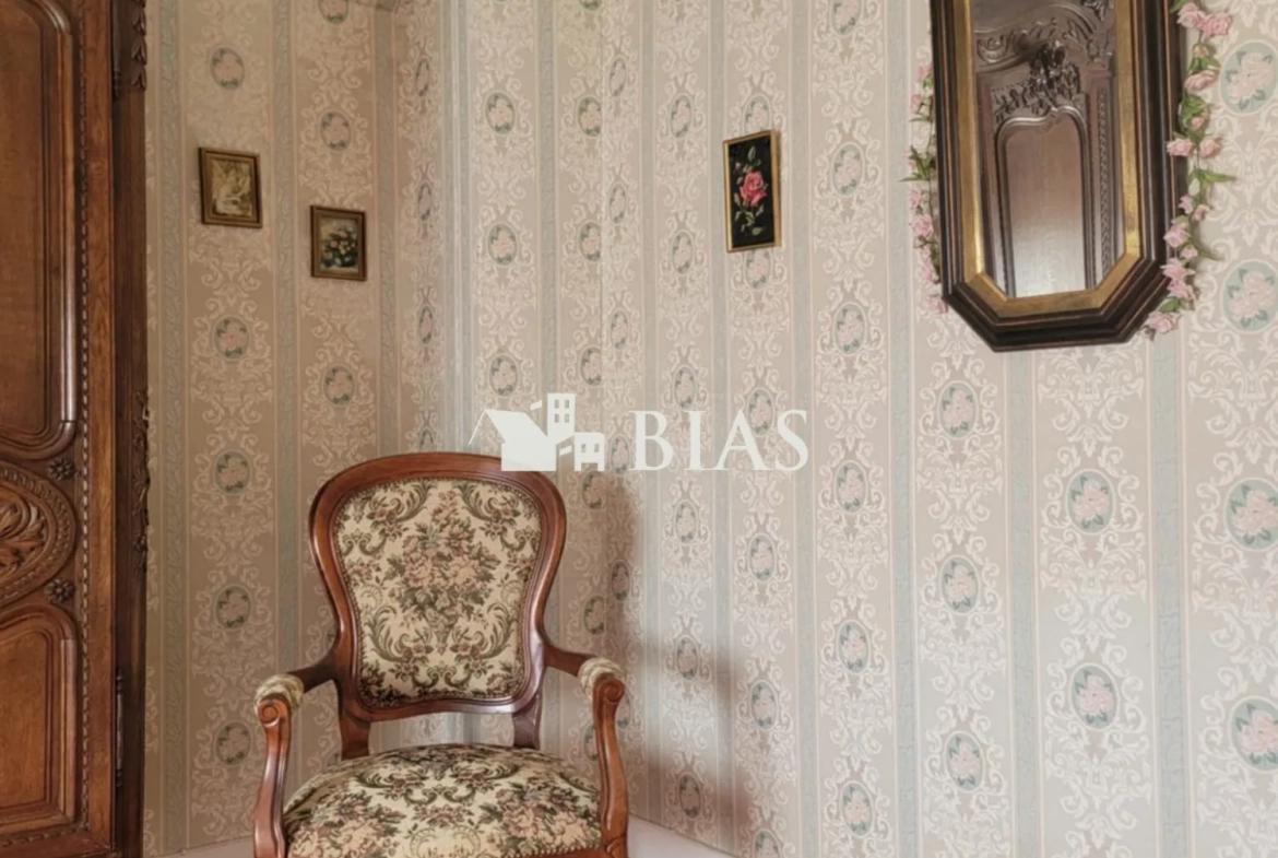 Maison à vendre au Trait avec jardin, garage et potentiel de rénovation 
